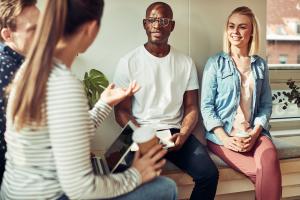 Three people talking to each other