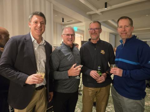3 men at an event